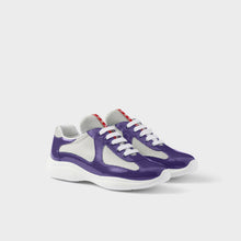 Violet patent mesh runner sneakers three-quarter view