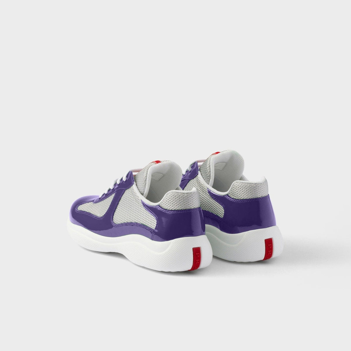 Violet patent mesh runner sneakers rear view