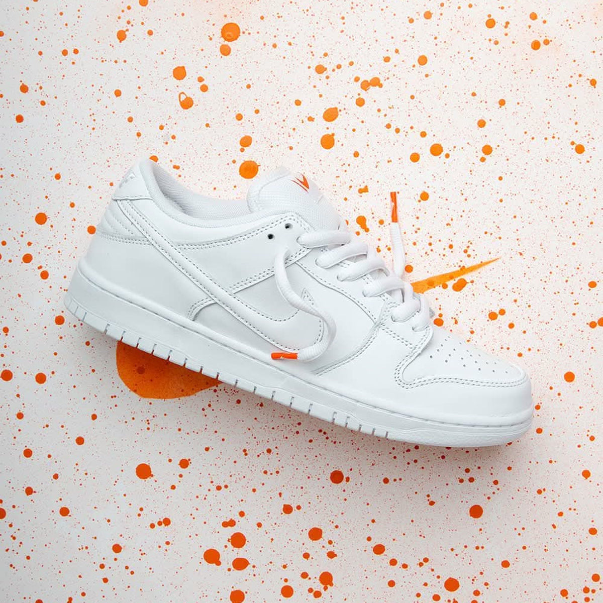 Dunk Low Pro ISO Triple White / Orange Label - Triple White / Orange Label - three-quarter lifestyle view
