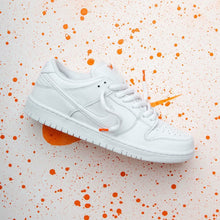 Dunk Low Pro ISO Triple White / Orange Label - Triple White / Orange Label - three-quarter lifestyle view