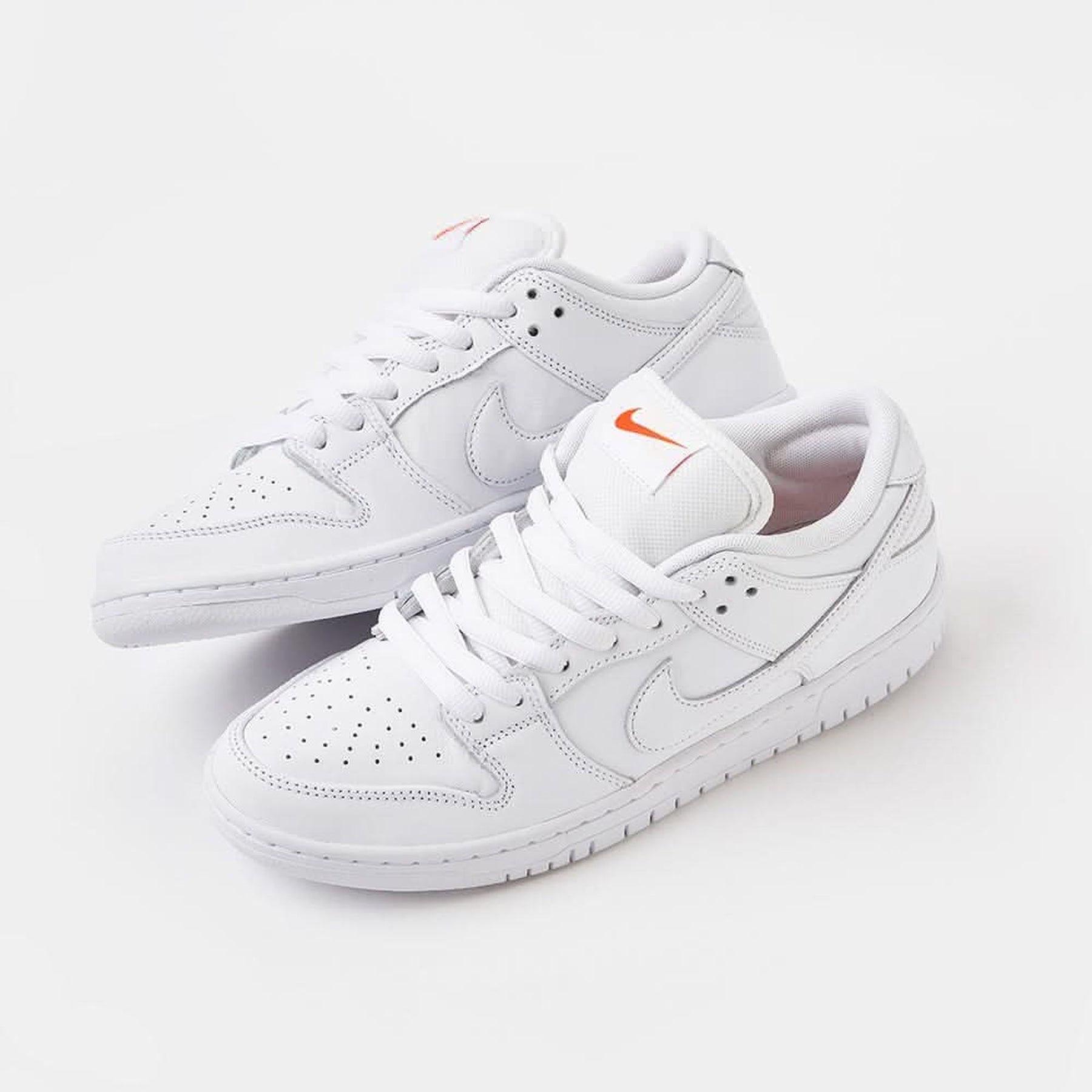 Dunk Low Pro ISO Triple White / Orange Label - Triple White / Orange Label - three-quarter pair view