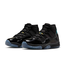 AJ11 Retro Gamma - Black / Gamma Blue / Varsity Maize - front three-quarter pair view